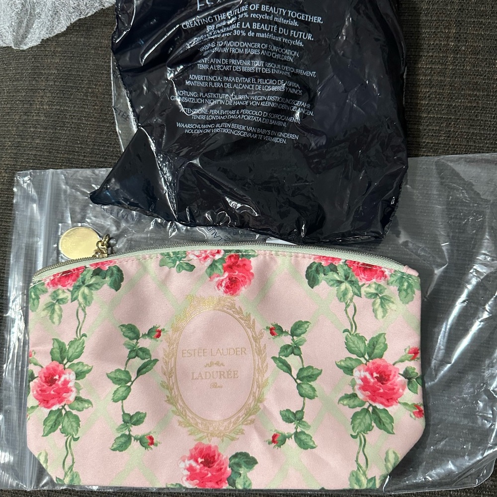 Estee Lauder Floral Cosmetic Bag with trial size bag